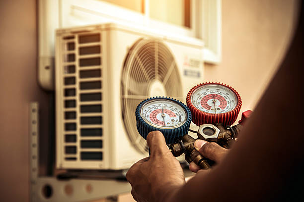 Professional Air Conditioning Service technician working in Buck Creek, IN